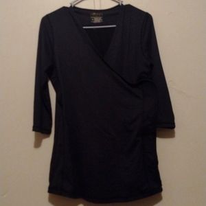 NuRoo baby wearing shirt